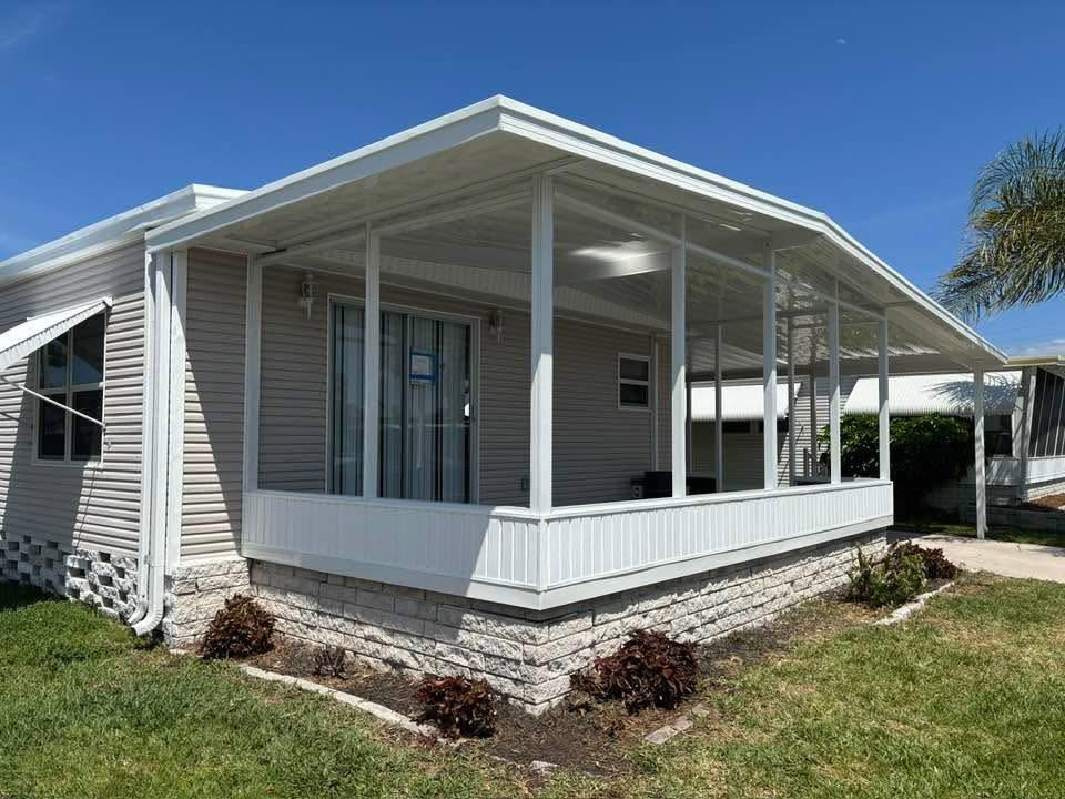 Solid-roof aluminum patio cover installed by Daly Aluminum